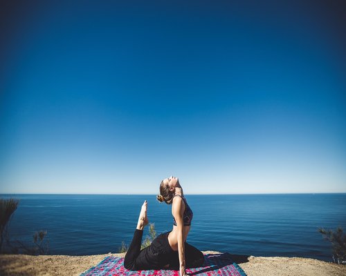Woman stretching arms during a break
